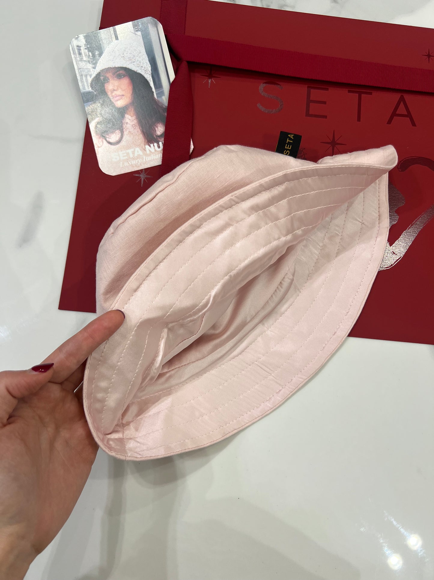 Cappello da pescatore in lino e seta rosa baby