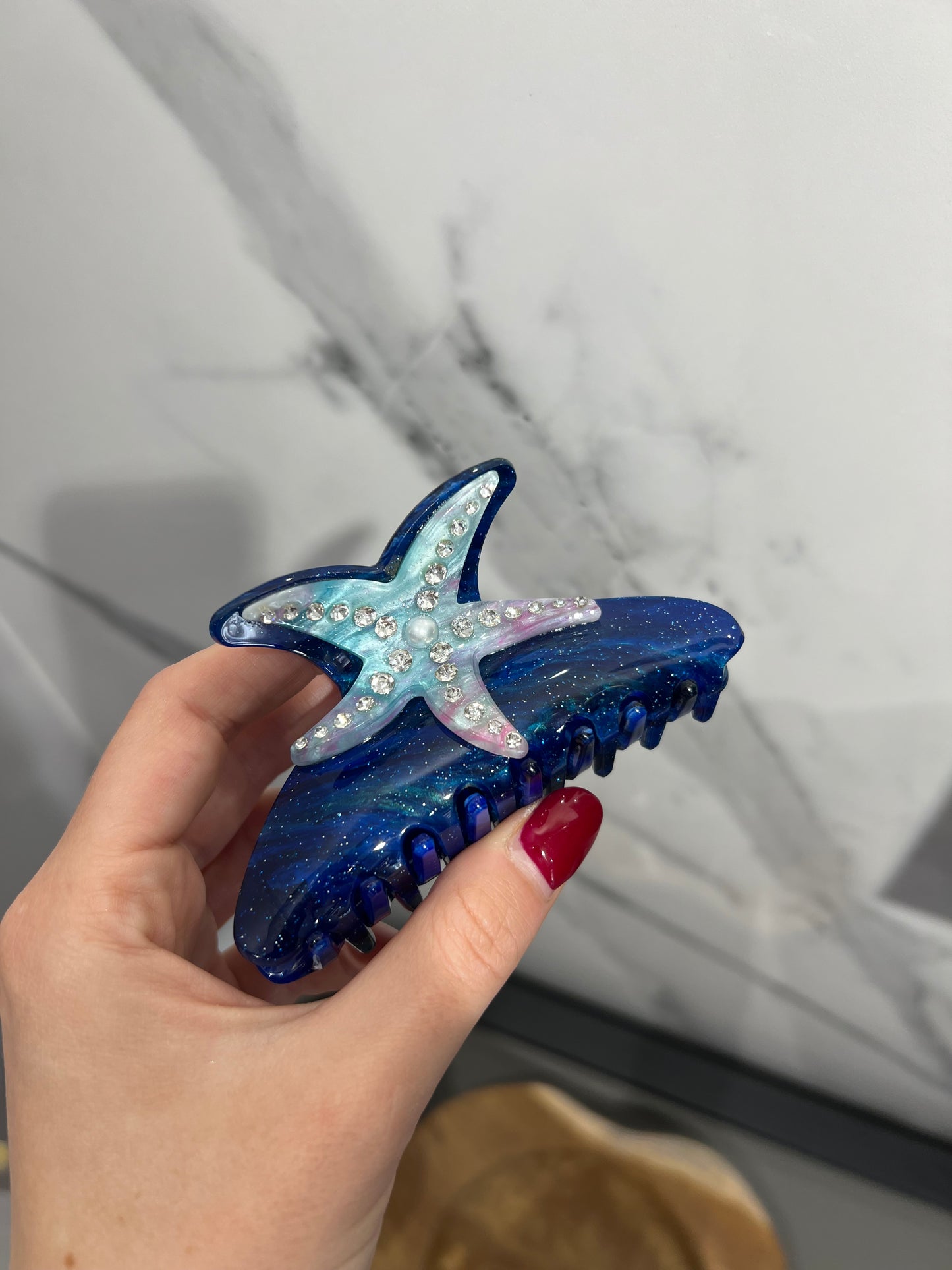 Fermaglio per capelli a forma di stella con diamanti blu scuro