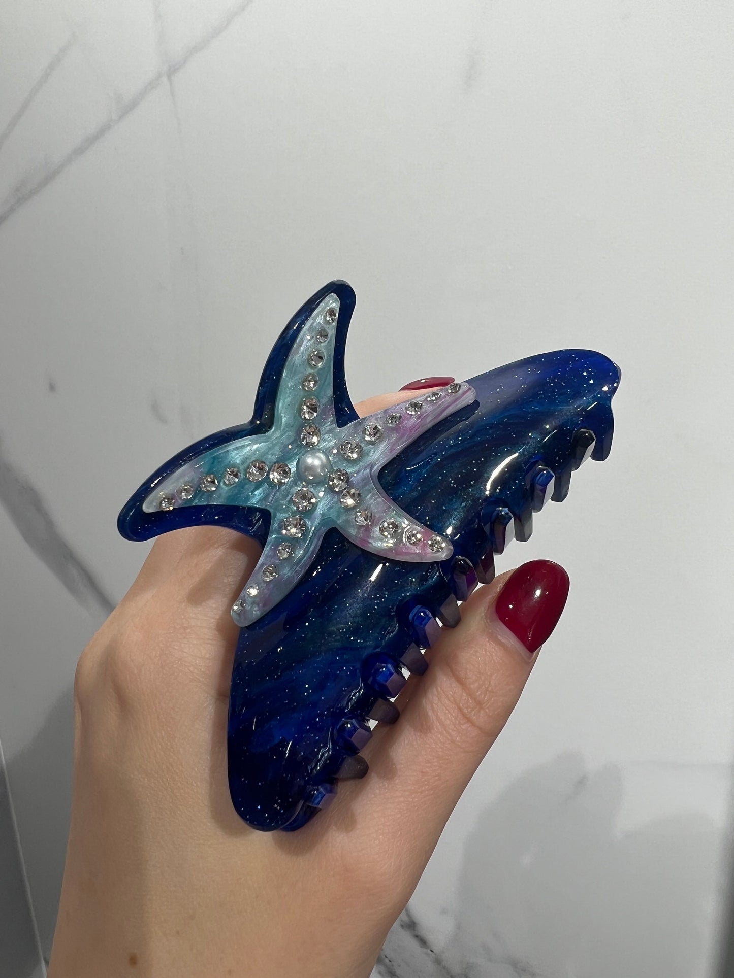 Fermaglio per capelli a forma di stella con diamanti blu scuro